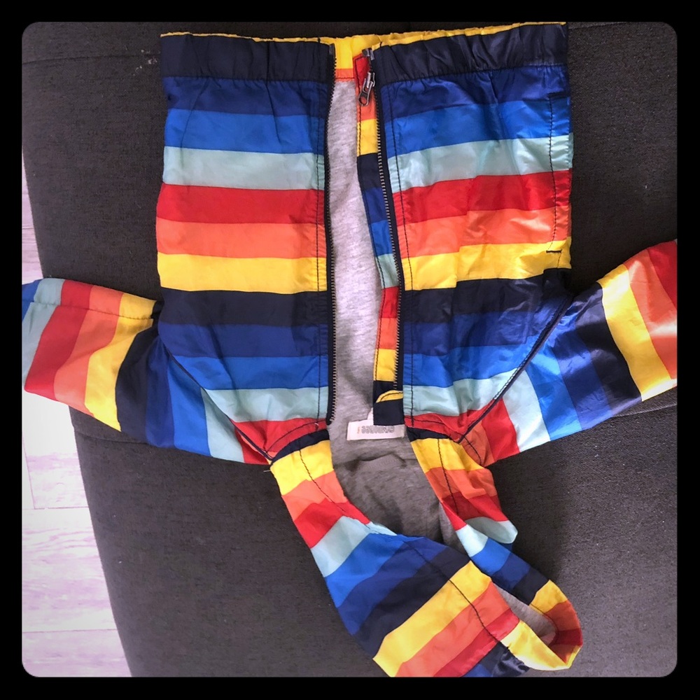 Baby rainbow colored rain jacket
